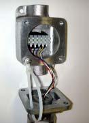The sensor is normally installed on an accessory junction box, which contains a terminal block for use in connecting the sensor wires to the required 24 volt DC power source and the measuring