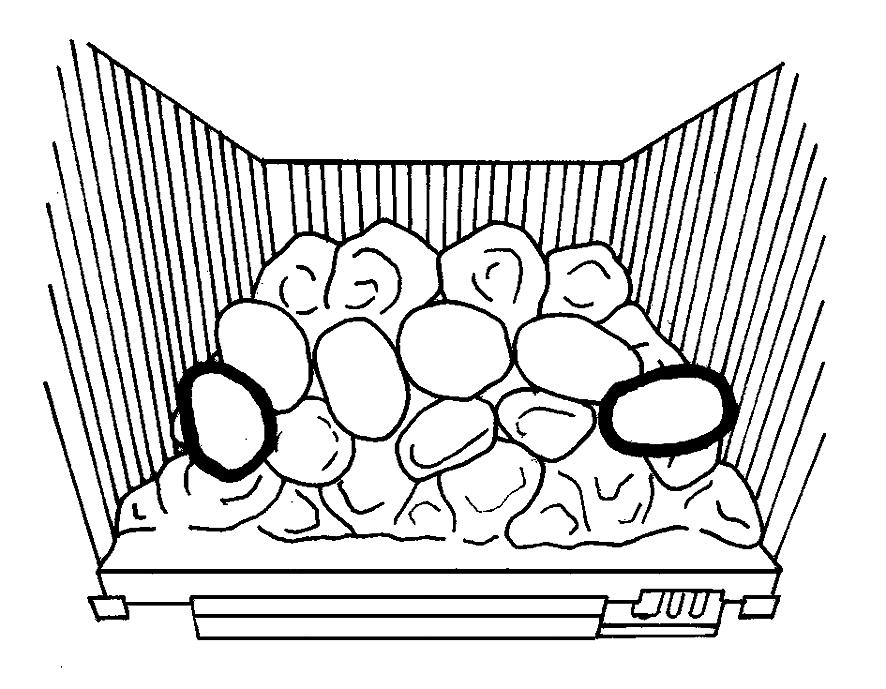 Installation Instructions Place the next four pebbles as shown resting between the flame baffle and the first row of pebbles, see Diagram 28.