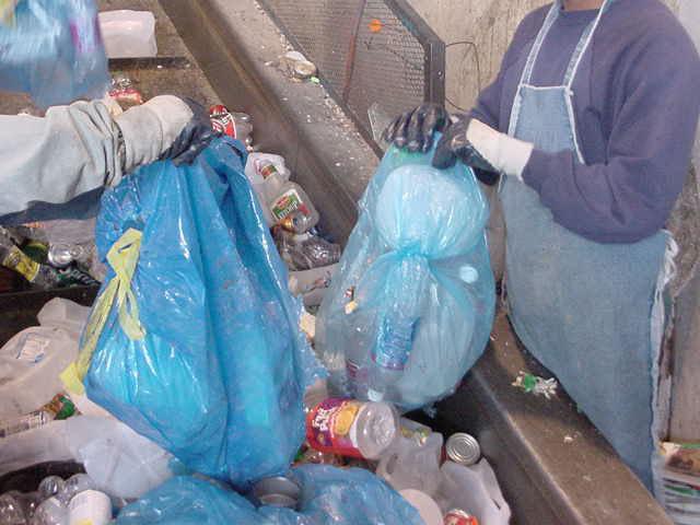 Eliminating Blue Bags: Cut Costs and Reduce Waste Residents save money in not having to buy one time use bags County saves money in not having to employ inmate labor to de-bag material, provide
