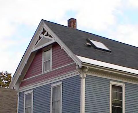 Stick Style Defining Features: Cross gable roof.