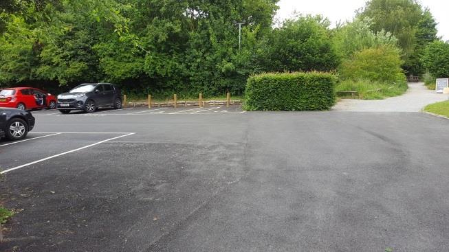Below: Tyland Barn main entrance View to disabled car park spaces and main path into site.