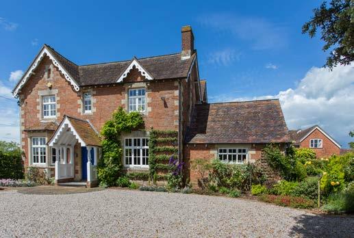 Handlow House CHURCHAM GLOUCESTERSHIRE GL2 8BB Occupying an elevated position with panoramic views over its own grounds, a handsome Victorian home accompanied by a range of