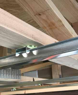 Fasten the SonusClip to the joist using the approved fasteners (3" screws are recommended). Tighten fasteners until they snug up into the metal washer. SonusClip must not be overtightened.