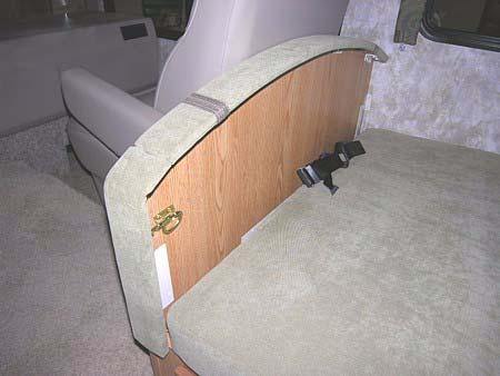 SECTION 3 DRIVING YOUR MOTOR HOME FOLD-DOWN DINETTE SEAT (Models without front slideout and with dinette seat directly behind driver or passenger front seat) On some models, the dinette seat located
