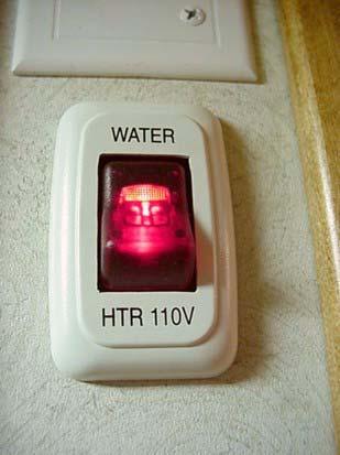If this happens, turn the Water Heater switch off for about 5 minutes, then turn it back on. See the water heater user s guide in your InfoCase for further information.