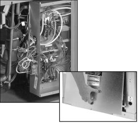 Separate holes are provided on the cabinet to facilitate main power and low voltage control wiring.