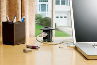 Retractable Work Surface Receptacle Concealed receptacle provides safe and convenient desktop power.
