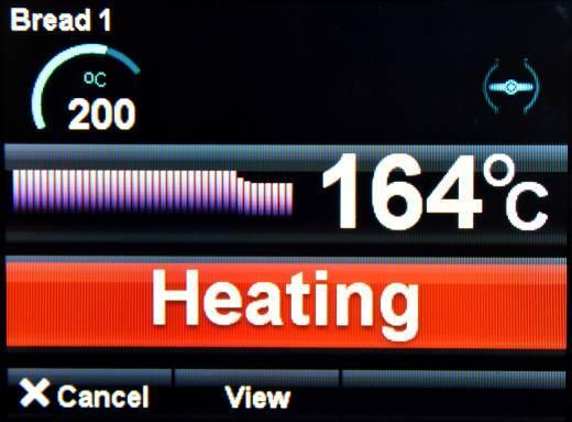 IF THE OVEN IS NOT UP TO TEMPERATURE IT WILL SHOW THE HEATING SCREEN.