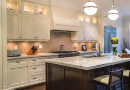 However, moving south of New England and into the cities, more industrial and modern stylistic elements and the use of grays and mixed media in kitchen designs is becoming more prevalent in urban