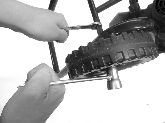Place the small washer (14) onto the wheel axle (17) followed by the locking nut (16).
