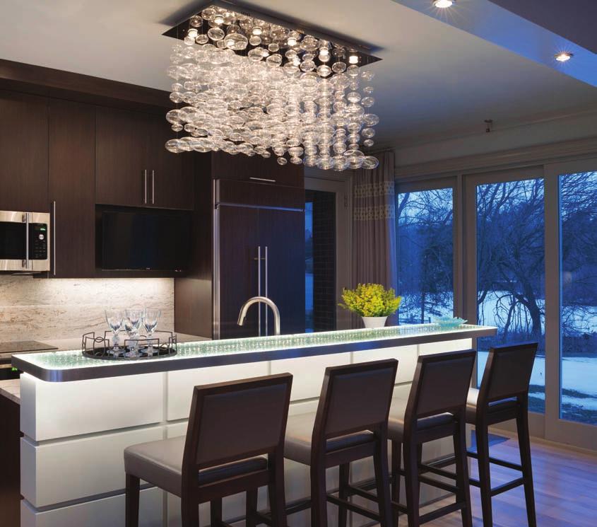 I love the dark wood contrasted with the glass countertop and the bubbles chandelier.