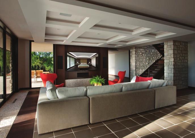 home theater INTERIORS Located at the end of the lower level and originally planned as a laundry