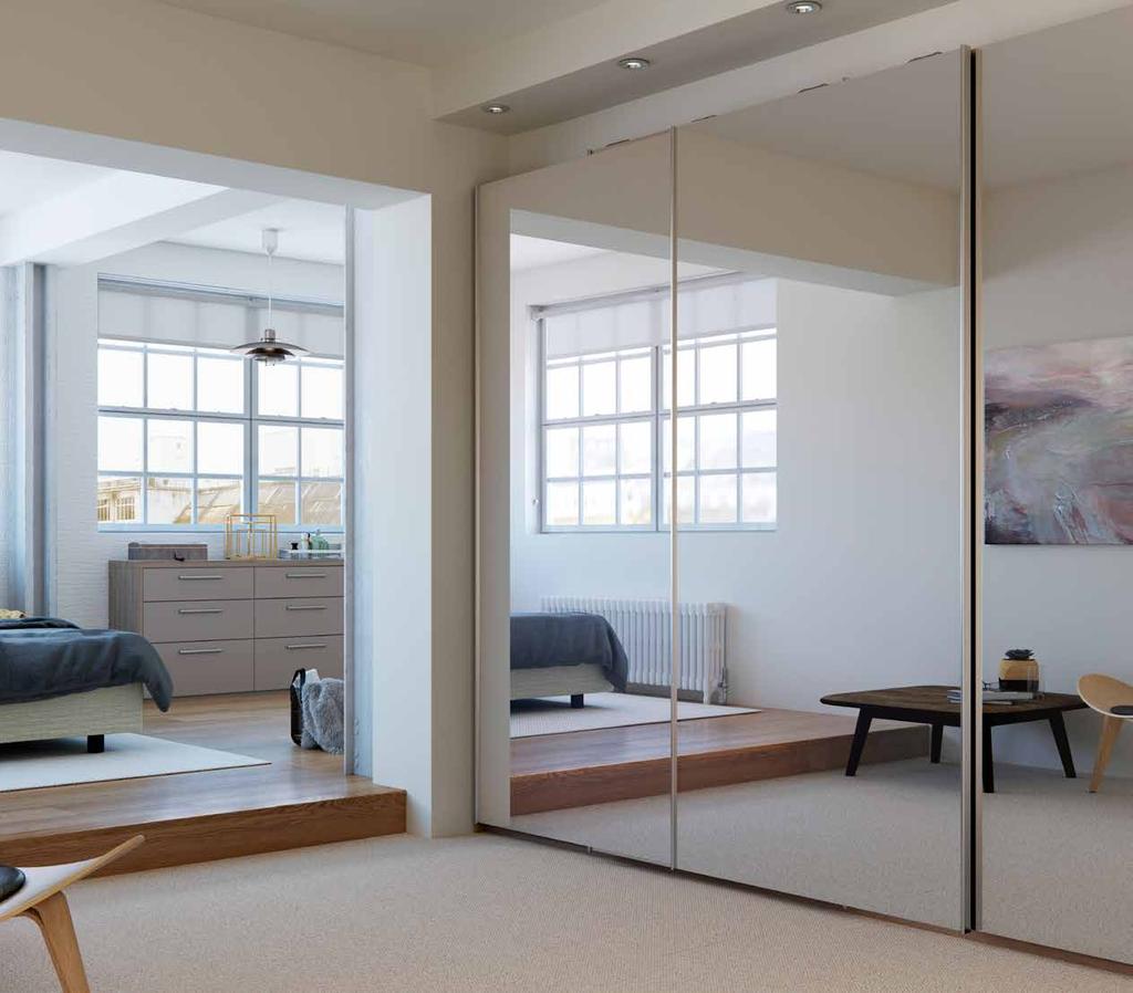Creating a contemporary look and feel by incorporating full length mirror effect panels into your bedroom, which provides a practical and striking finish.