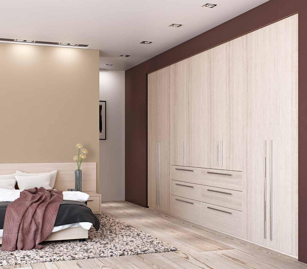 Clean, sleek and smooth transforming your bedroom space into a practical and modern wall of wardrobes.