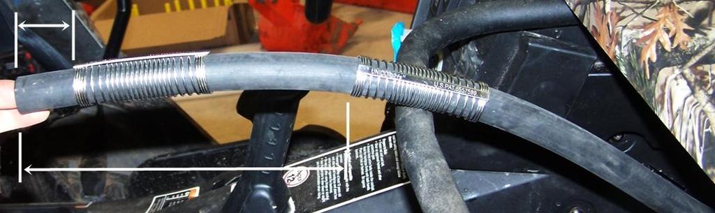 Elevate hose and keep together with previously installed heater hose.