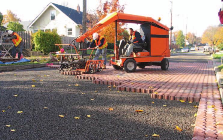 base (called a drainage blanket ) extends completely under the PICP pavement and streets with the asphalt center lane and PICP curb lanes.