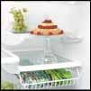 Profile Arctica Bottom-Freezer Drawer Models: 22 to 20 cu. ft. QuickSpace shelf quickly slides out of the way to make room for tall items.