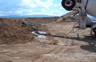 Do not dispose of excess concrete or wash chutes and equipment onto bare soils