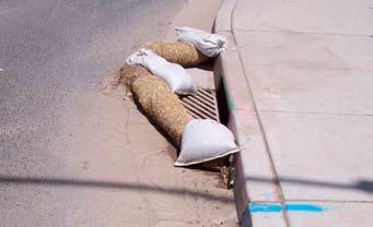 Nevada BMP Field Guide June 2008 Excellent storm drain inlet protection with stone-filled bags surrounding the