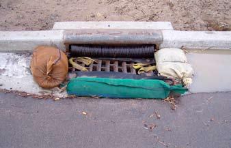 Note: Under-grate filter bag BMPs should be inspected regularly and should never be allowed to fill with sediment and left unattended for long periods of time, or they may block off the storm