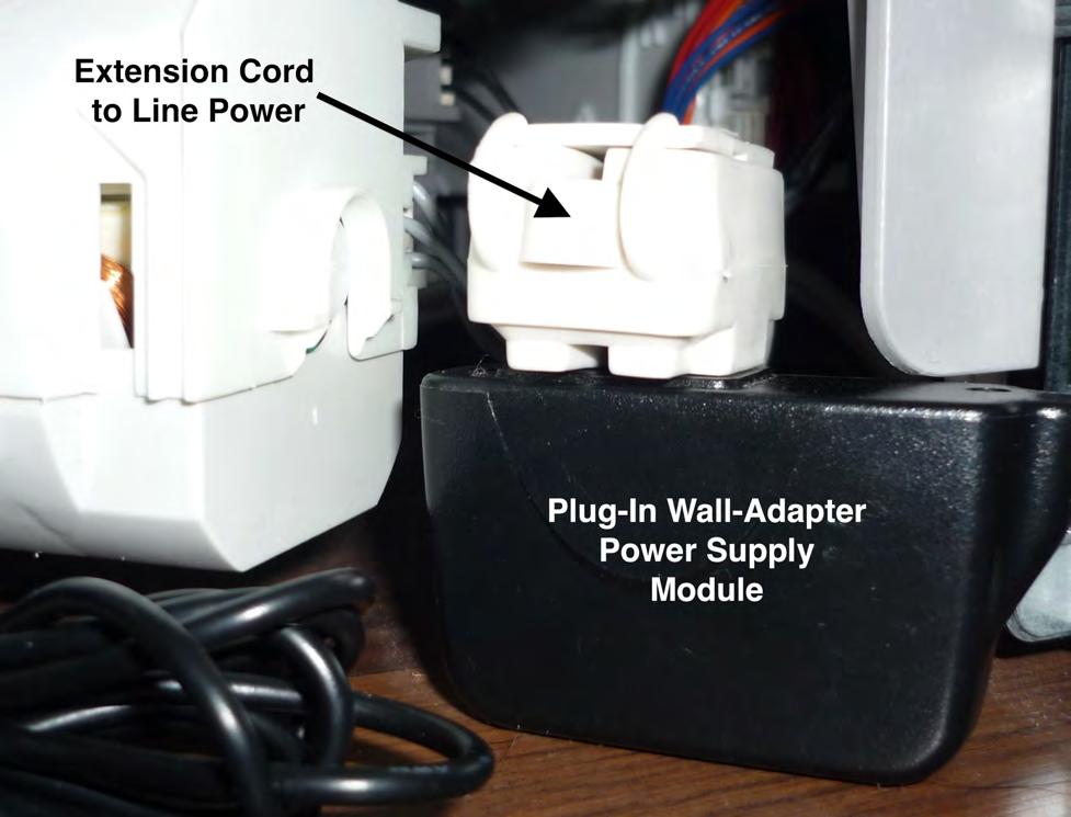 Figure 6. I used a plug-in wall-adapter power cube to power the dishwasher indicator circuit. The "cube" connects to mains power through an extension cord and a wall outlet.