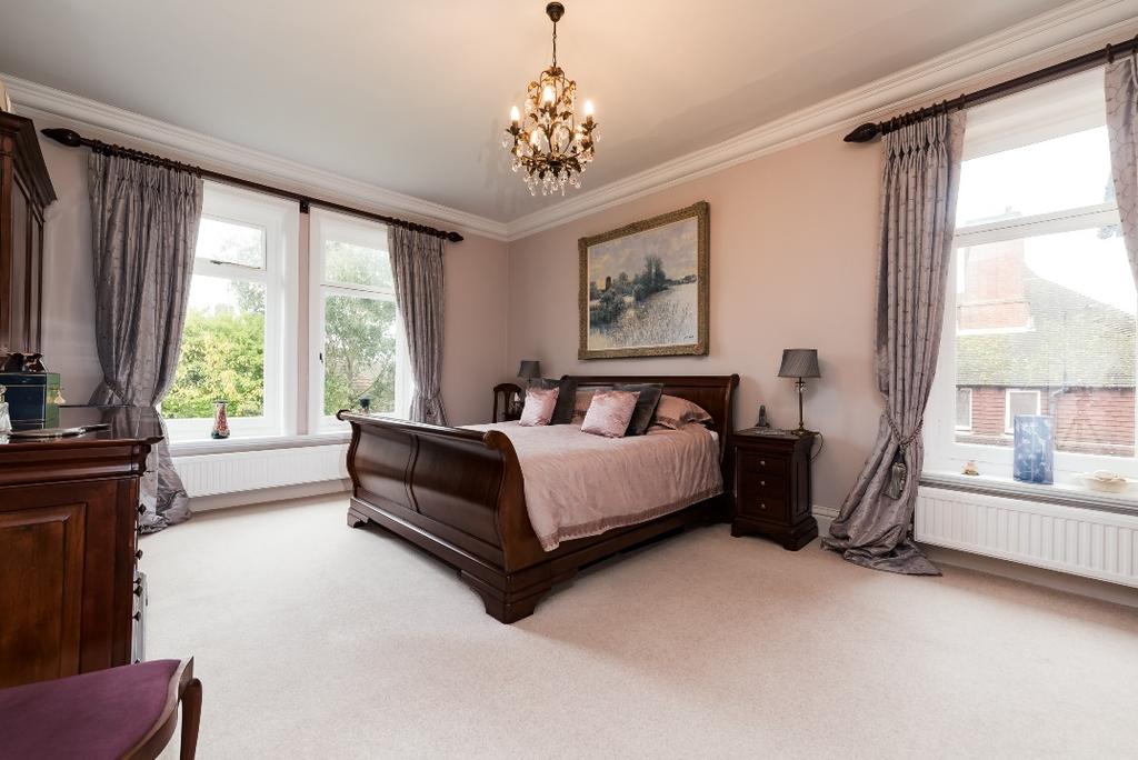 Four First Floor Double Bedrooms and Family Bathroom Big and bright, the first of the double bedrooms is on the half landing and spans from front to back of the house with windows at each end.