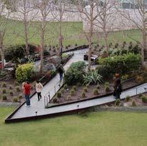 WITH EXPOSED AGGREGATE GRASS / SHRUBS SLOPE GRASS / LAWN RAMP WITH HANDRAILS CONCRETE