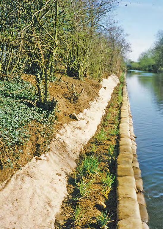 trimmed for access Figure.7.2 Section through repaired bank (see Figure.7.3 for more detail) Towpath Washout profile (extent varies) to be backfilled with dredged granular material Old bagwork used to fill part of eroded area.