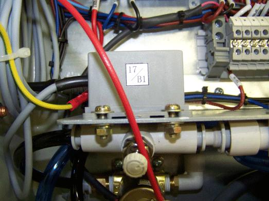 Figure 13 Route the sensor wire through the bottom of the control box 2. See Figure 14.
