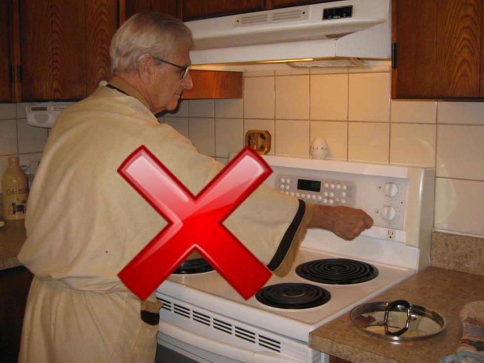 Slide 10 Q: What is the hazard here? A: Wearing loose clothing when cooking.