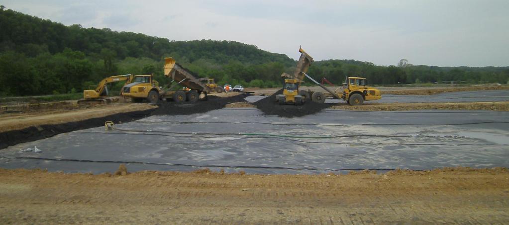 FIELD CONSTRUCTION Fly ash layer placement perpendicular to geotextile