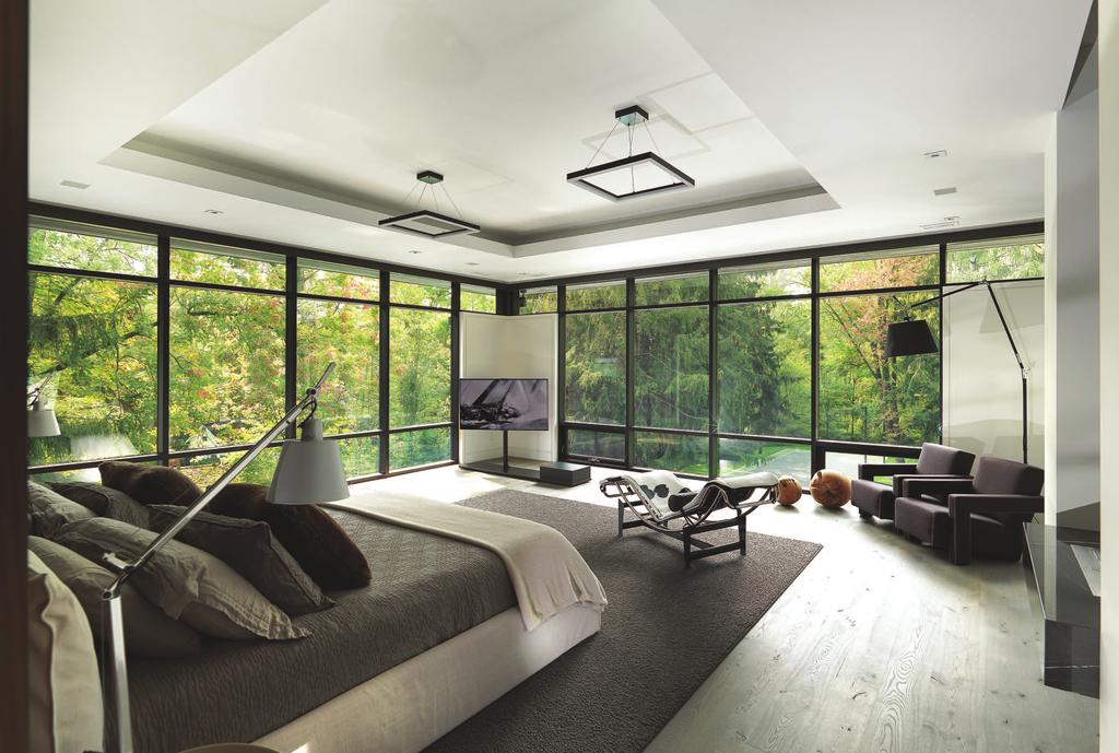 The master bedroom facing the lush gardens.
