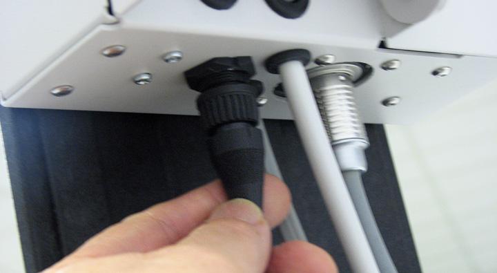Plug the level-sensor cord connector into the socket located on the motor housing below.
