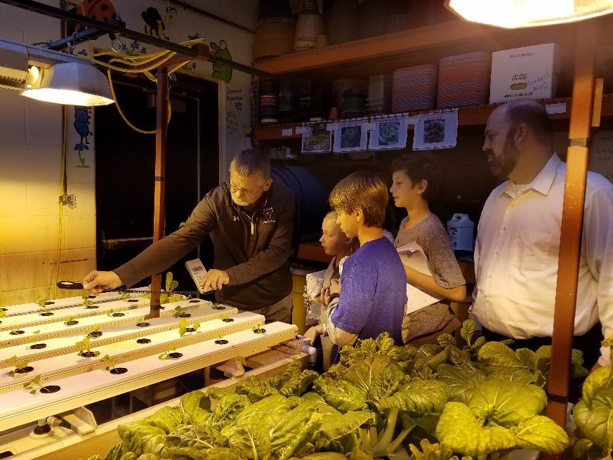 We visited Mr. King, agriculture teacher at Holmen High School, Wisconsin. Mr. King has a hydroponic garden at his school.