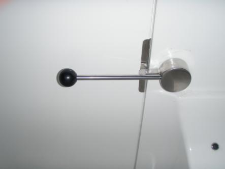 Customer Use & Operation Guide 1. Enter the walk in tub then close the door and seal it by pulling the handle toward you into the locked position. Below are pictures of the walk in tub handle.