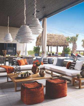 Outside, the wraparound terrace provides the perfect spot for Garcia to entertain in a garden paradise.