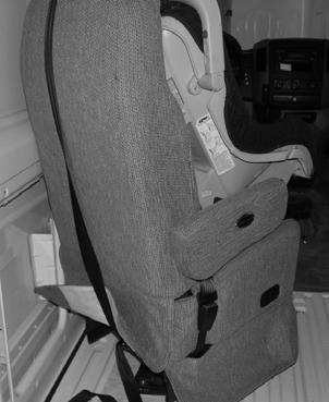 SECTION 3 DRIVING YOUR MOTOR HOME 1. Set child seat upright on rear sofa or in the companion seat. 2.