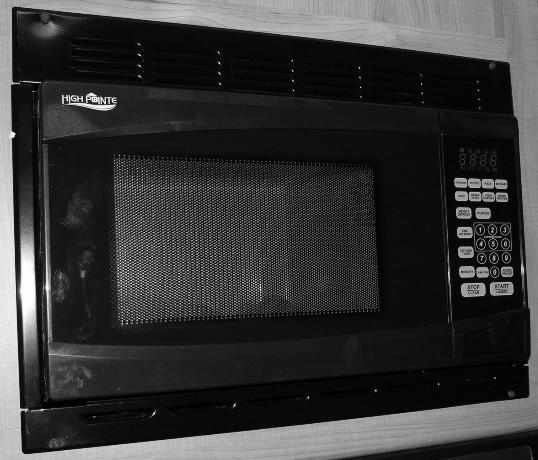 SECTION 4 APPLIANCES AND SYSTEMS Microwave Oven (Brand, model, and appearance shown may vary from your model) -Typical View The approximate fluid levels are measured by electronic