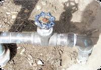 Look for a hose bib (outside faucet) next to your home with a pipe coming up from the ground (See Photo 1) 3.