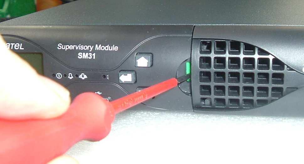 Fig 4. For removal, unlock SM3x by lifting green locking tab. Fig 5. SM3x cable access The relay states labelled Normally Open or Normally Closed are for their de-energised state.