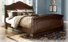 Bed (56/58/94) B553 North Shore (Ashley Millennium) Rich traditional design in opulent brown color Serpentine shaped design and diamond