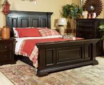 B643 Willenburg (Signature Design Millennium) Traditional lodge inspired bedroom made with hardwood solids and birch veneers in a transparent dark coffee finish Mansion panel bed has raised panels