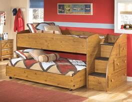 B233 Stages Replicated medium distressed country pine grain Bun feet on cases and beds, plank pattern on HB and FB Arched top moldings, drawers, and top rails Queen bed also available (see adult