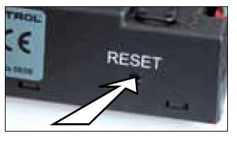 press and hold the receiver s reset button (see figure below) until you hear two (2) beeps. The first beep is short and the second beep is long.