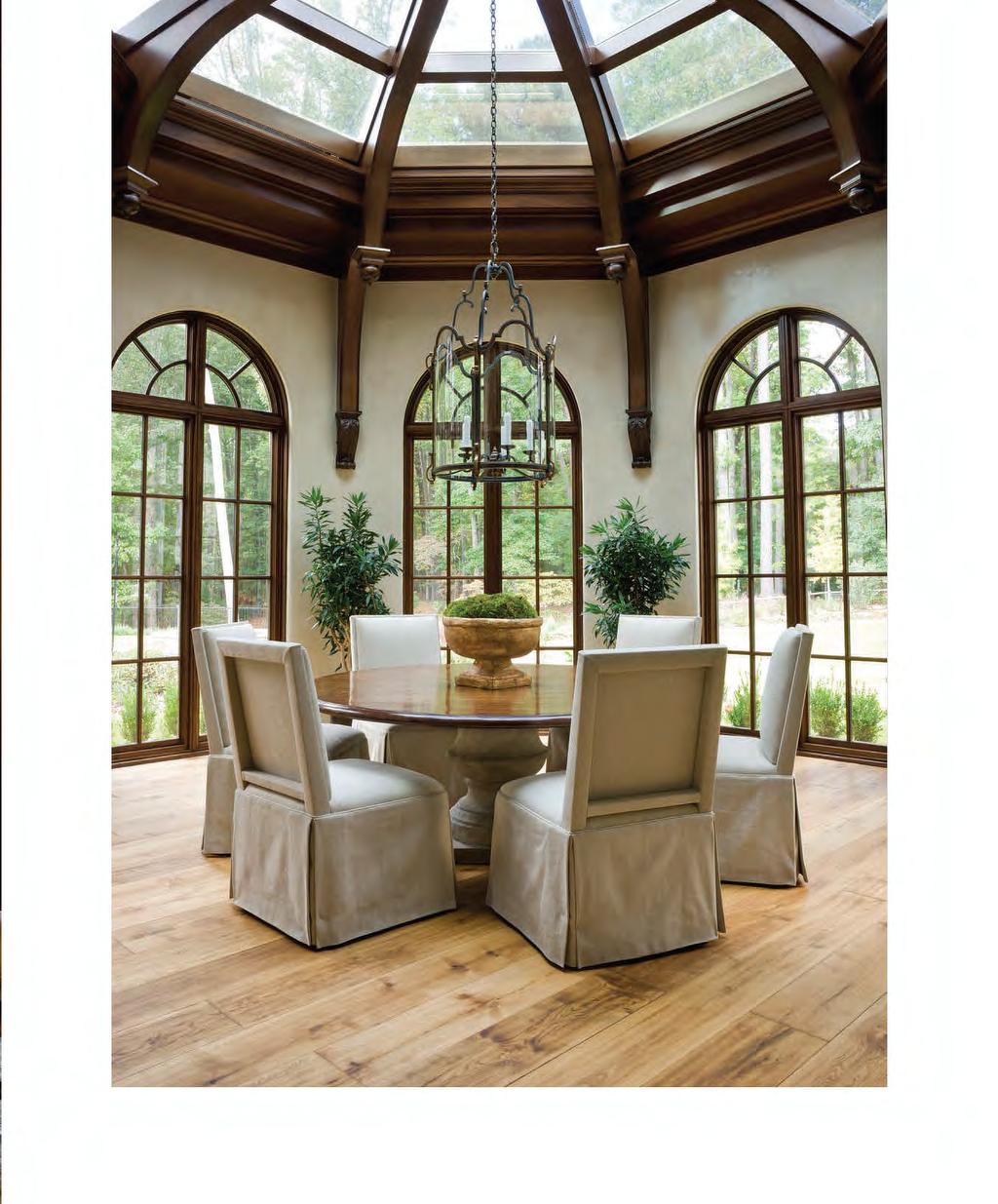 above Inspired by the Biltmore Estate s interior conservatory, architect Bill Harrison designed a breakfast room with sweeping mahogany