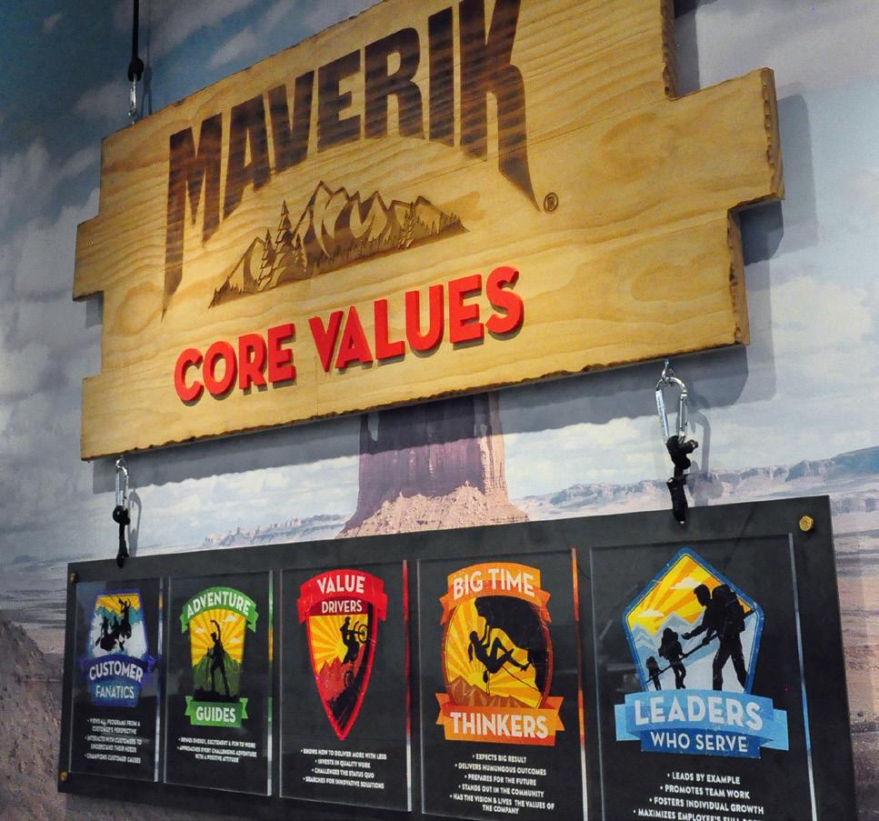 Proudly displayed in the lobby - suspended from the ceiling and aptly connected by climber s carabineers, the Maverik logo was comprised of two expertly crafted pieces.