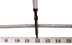LEAD TERMINATION PREPARATION Module Point STEP 1: Determine the module length of the heating cable. Module points can be identified by slight indentations on the rounded surface of the outer jacket.