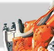 spraying and roughing or roughing and placing of steel soles The combi robot is a