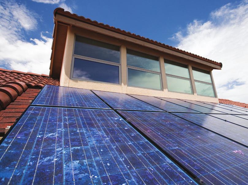 r i g h t: Photovoltaic panels nestle unobtrusively into the south roof, helping generate some of the electrical needs of the residents. carl s system generates an average of 2.