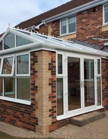 Orangeries traditionally take the solid wall of an extension and combine this with the glass panel ceiling of a conservatory to give a feeling of great height and space to the